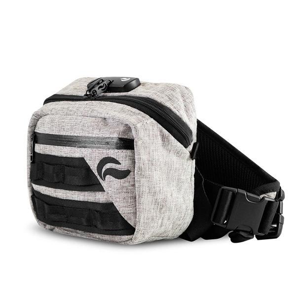 The Skunk Kross Stash Storage Bag is a light gray fabric waist bag with a black zipper, front straps, side-release buckle, small black logo, smell-proof carbon lining, airtight storage, and a combo lock for discreet odor elimination.